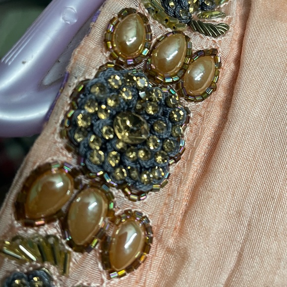 Light peach coloured slit kurta with beautiful pearl work in neck - Picture 10 of 13